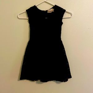 Black eyelet lace dress with bow accent